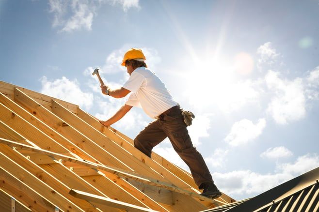 Roofer working on Florida new construction home